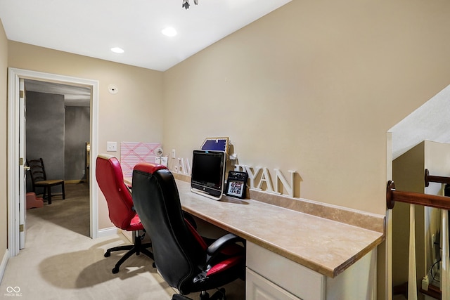 office space featuring light carpet, baseboards, and recessed lighting