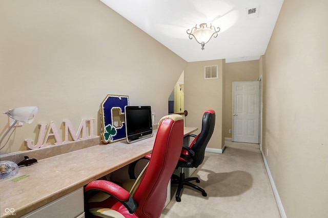 home office featuring visible vents, light carpet, and baseboards