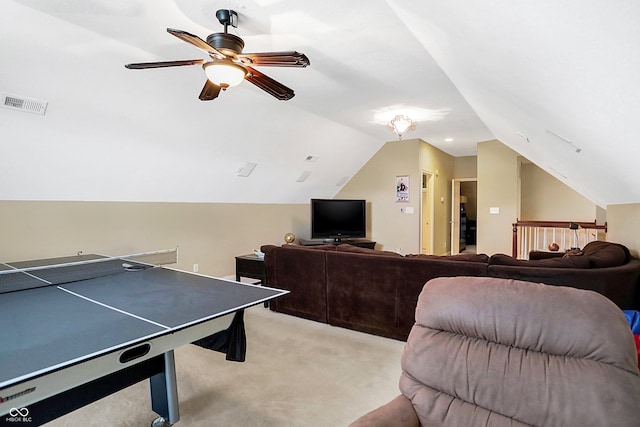 game room featuring light carpet, lofted ceiling, and ceiling fan