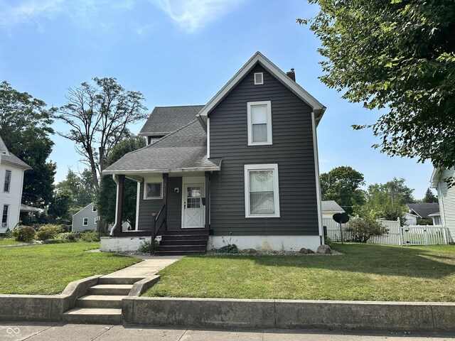 view of front of house with a front lawn