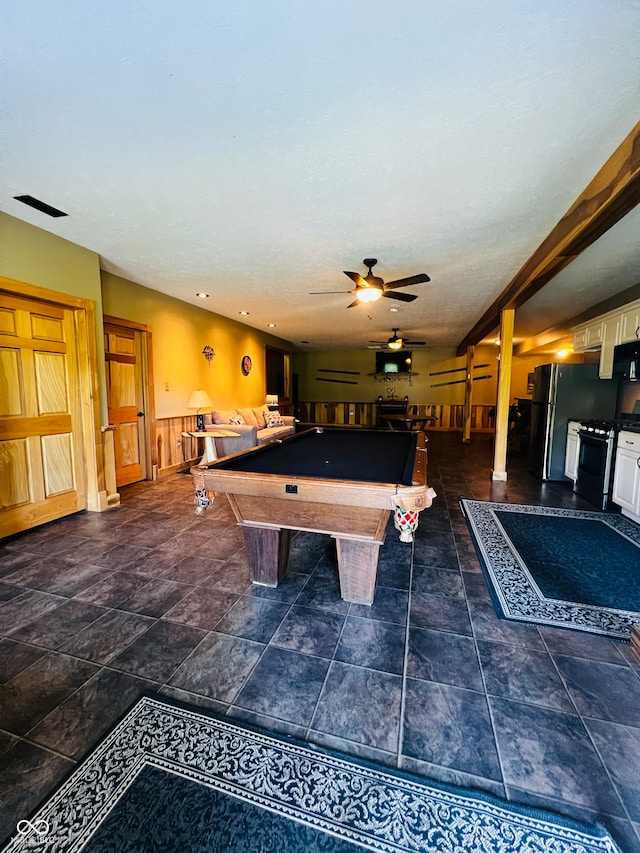 recreation room with dark tile patterned floors, ceiling fan, and pool table