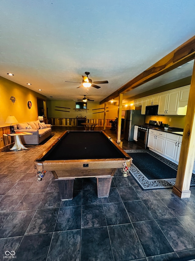 recreation room featuring billiards, dark tile patterned floors, and ceiling fan