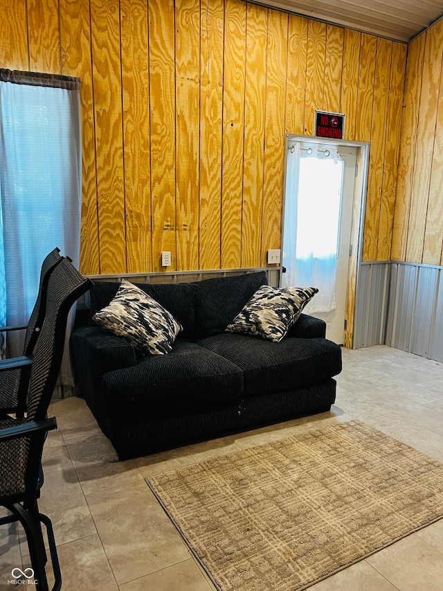 living room with wooden walls