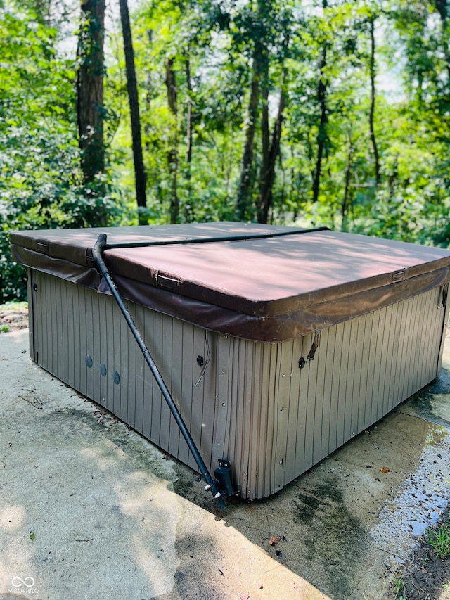 exterior space featuring a hot tub