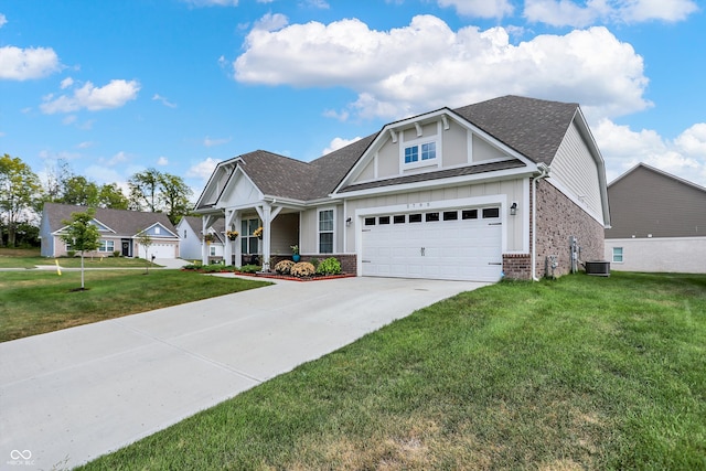 view of front facade featuring a garage, a front lawn, and a porch