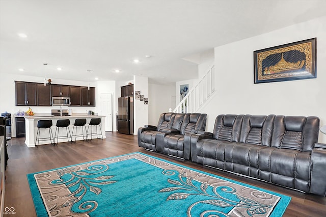 living room featuring dark wood-type flooring