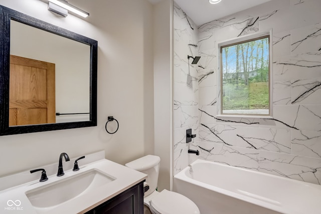 full bathroom with toilet, tiled shower / bath combo, and vanity