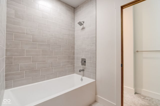 full bath with baseboards