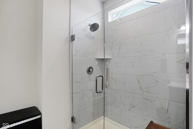 bathroom with an enclosed shower