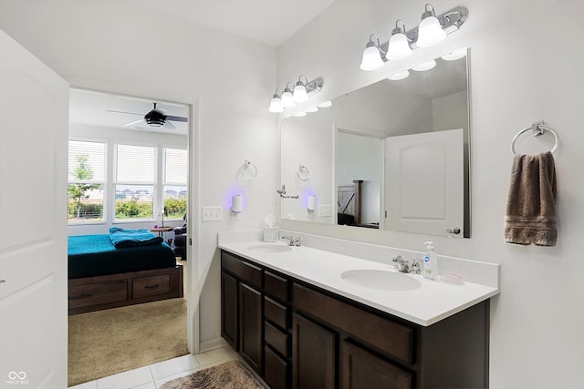 bathroom with ceiling fan, vanity, and tile patterned floors