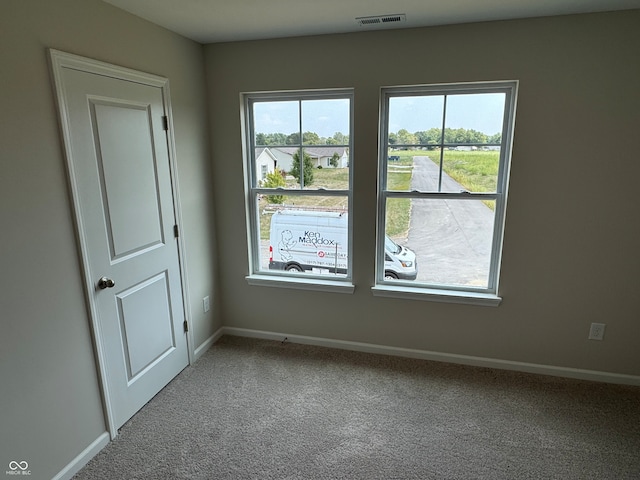 view of carpeted spare room