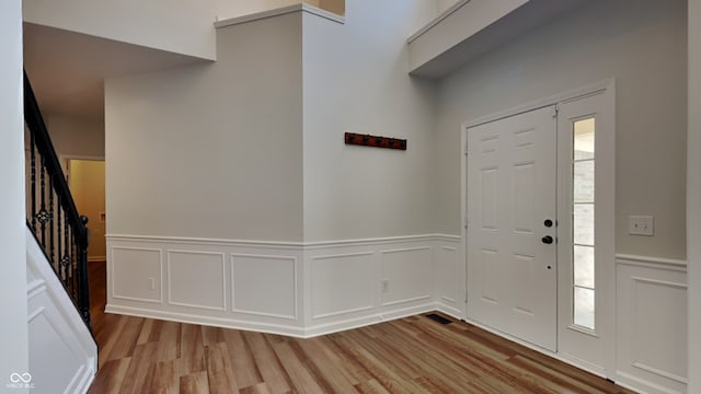 entrance foyer featuring light hardwood / wood-style floors