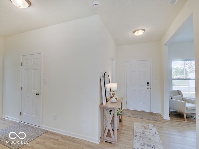 entrance foyer with light hardwood / wood-style floors