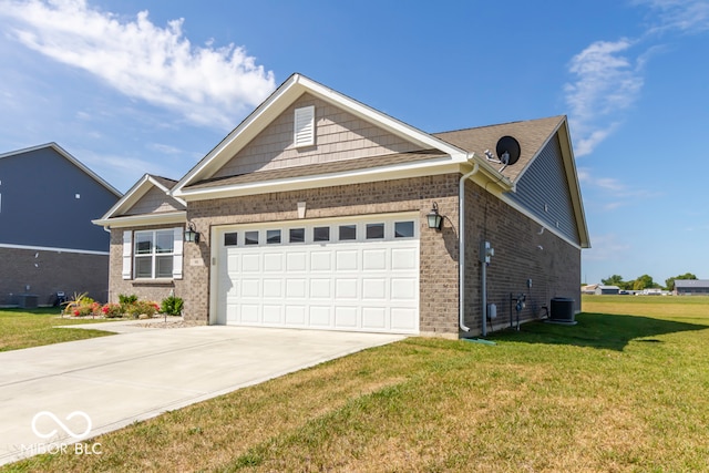 view of front of house featuring a garage, a front yard, and central air condition unit