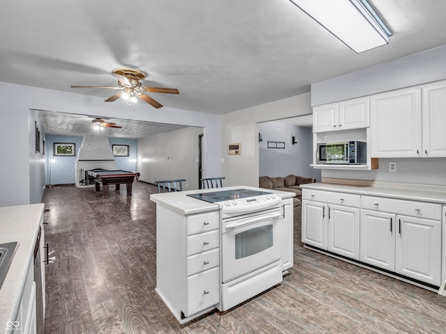 kitchen with pool table, hardwood / wood-style flooring, white cabinetry, ceiling fan, and white electric range oven