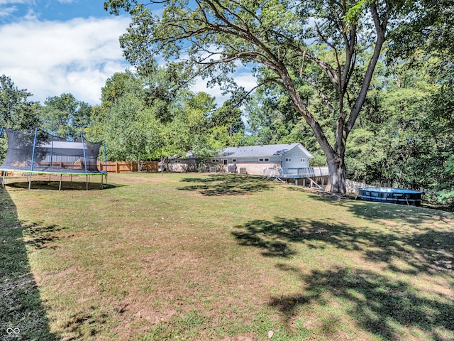 view of yard featuring a trampoline