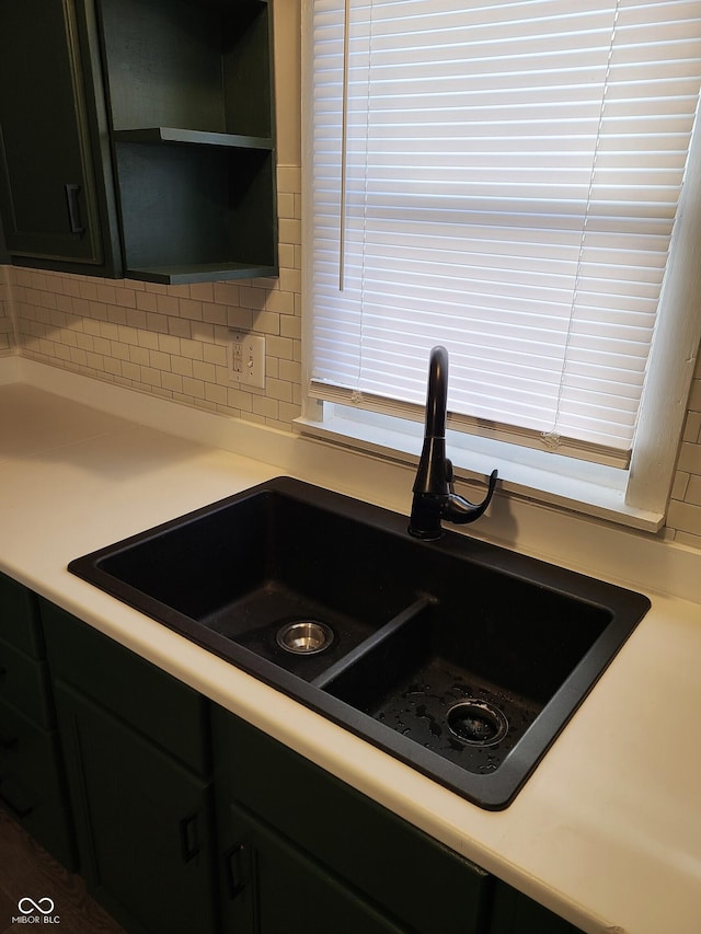 kitchen with backsplash and sink