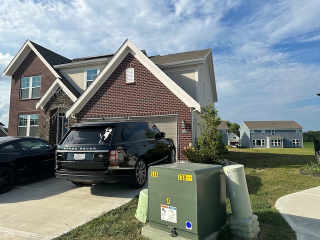 view of property exterior featuring a garage and a lawn