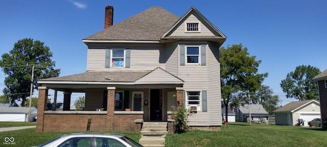 view of front of home with a porch and a front lawn