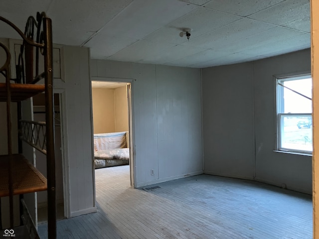 empty room with light wood-type flooring