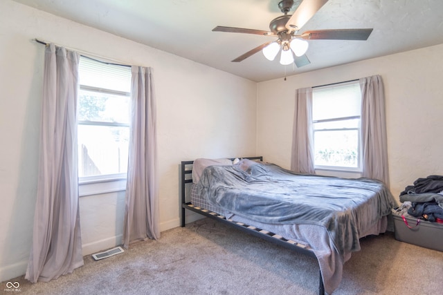 532 E Mills Ave, Indianapolis, IN 46227 - bedroom with visible vents, baseboards, ceiling fan, and carpet floors