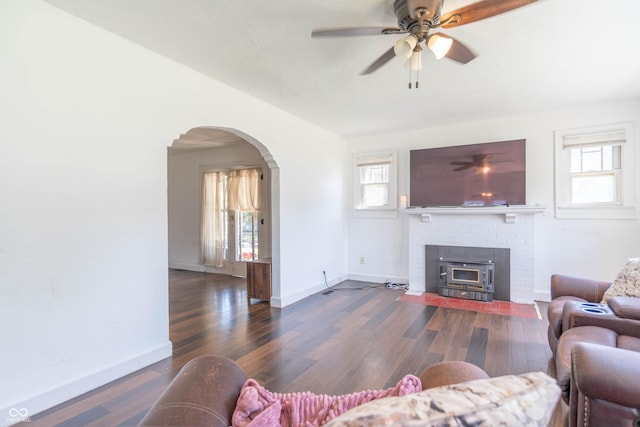 532 E Mills Ave, Indianapolis, IN 46227 - living area featuring baseboards, ceiling fan, vaulted ceiling, wood finished floors, and arched walkways