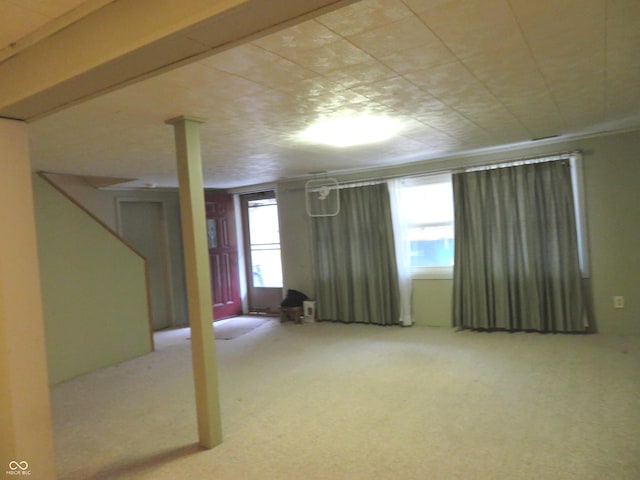 basement featuring carpet flooring