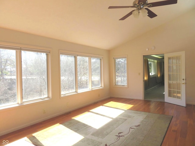 unfurnished sunroom with lofted ceiling