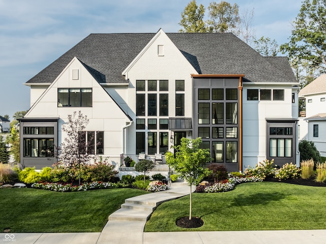 view of front of house with a front lawn