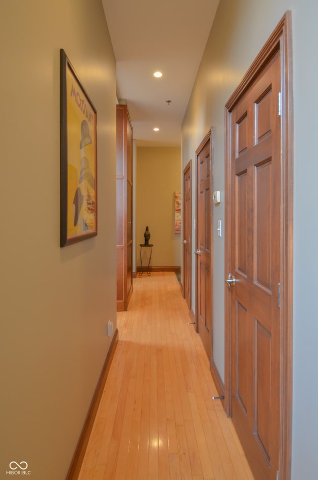 corridor featuring light wood-type flooring