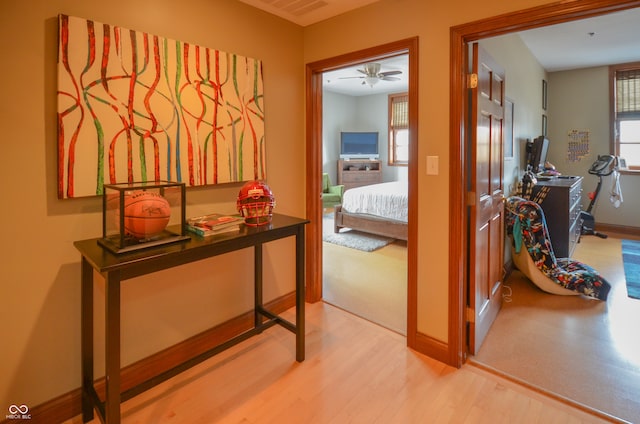 corridor featuring light hardwood / wood-style flooring