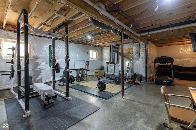 exercise room with concrete floors