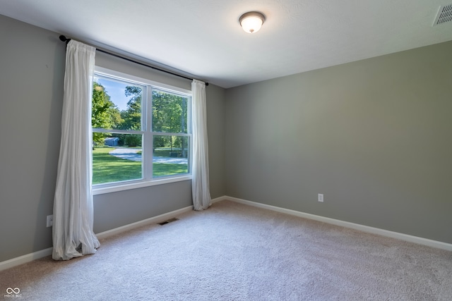 empty room with light carpet