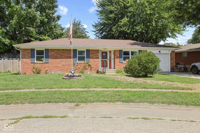 single story home featuring an attached garage, a front yard, fence, and brick siding