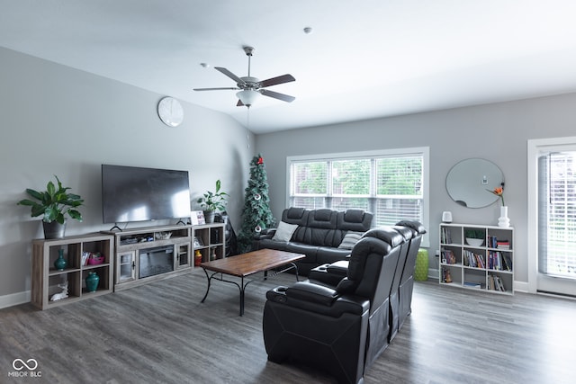 living room with hardwood / wood-style floors and ceiling fan