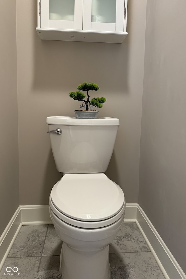 bathroom featuring toilet