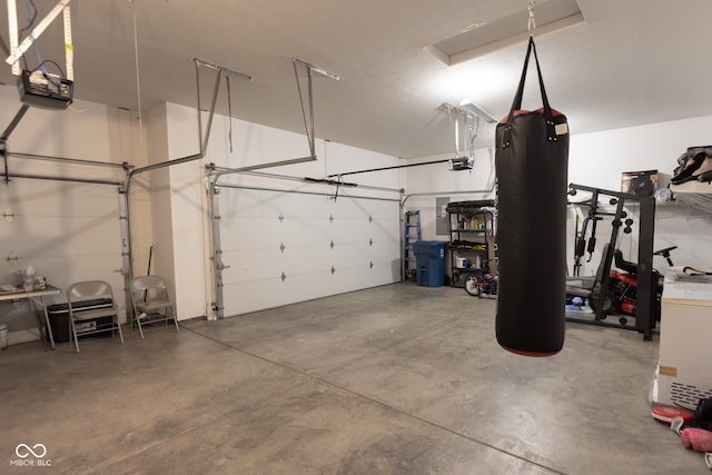 garage featuring a garage door opener