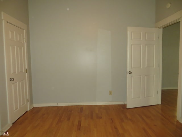 unfurnished room with light hardwood / wood-style flooring