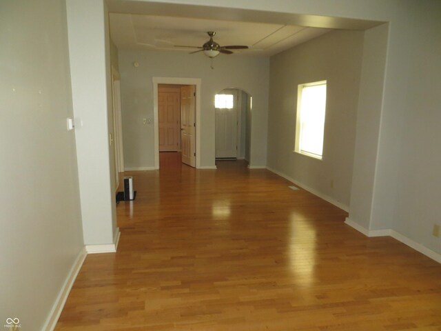 foyer entrance featuring ceiling fan and light hardwood / wood-style flooring