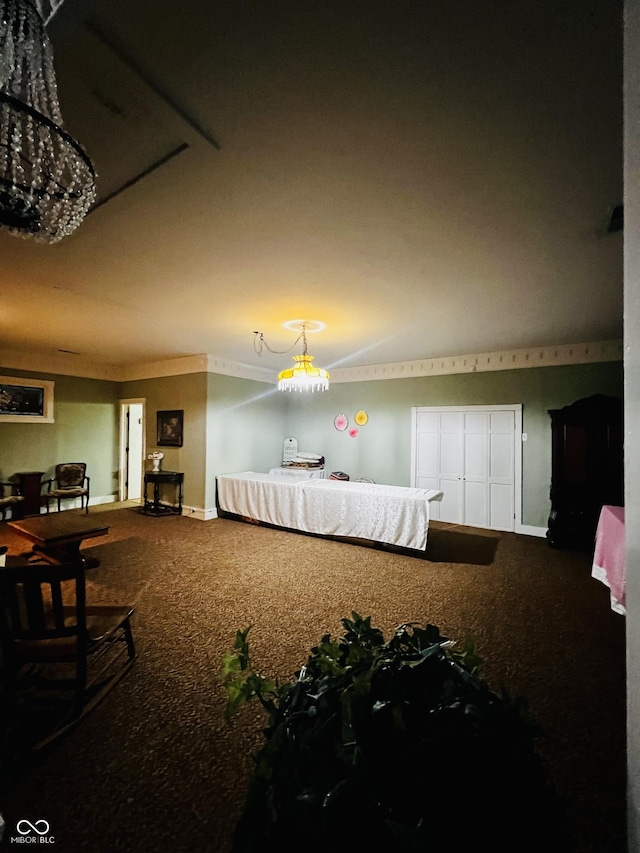 bedroom featuring baseboards and carpet flooring