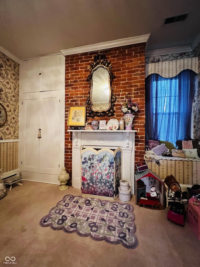 living area featuring visible vents, brick wall, ornamental molding, light carpet, and a brick fireplace