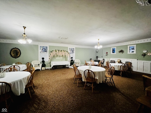 dining room with a chandelier