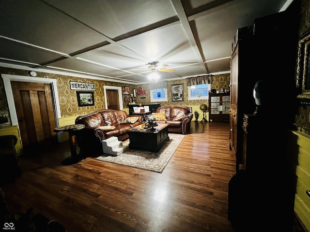 living room with coffered ceiling, wallpapered walls, a ceiling fan, and wood finished floors