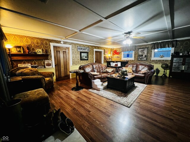 living room featuring wallpapered walls, wood finished floors, coffered ceiling, and ceiling fan