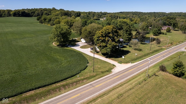 aerial view featuring a rural view and a forest view