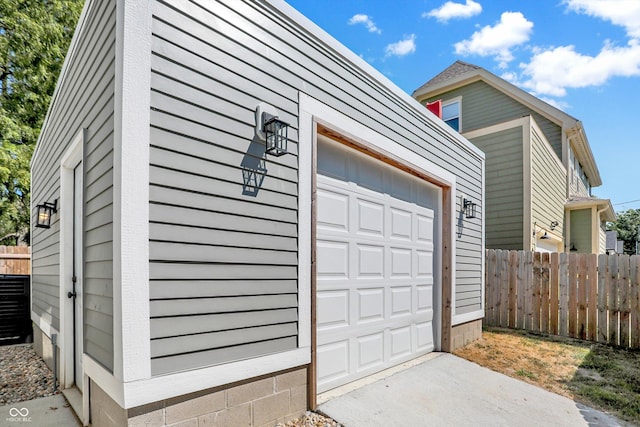 garage featuring fence