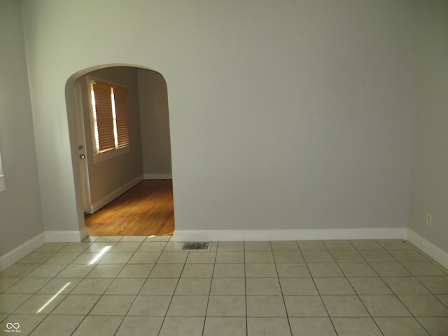 unfurnished room with light hardwood / wood-style flooring