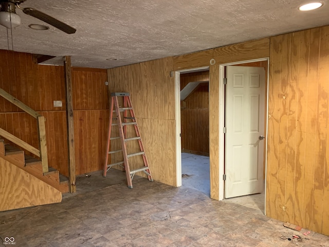 spare room with wooden walls