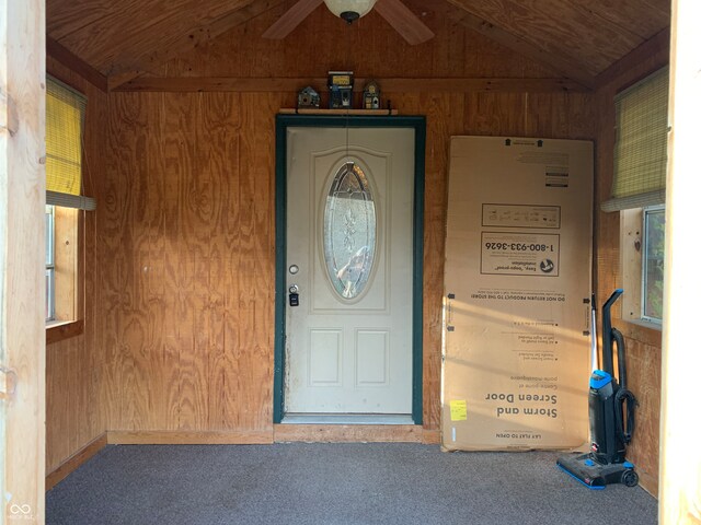 entrance to property with ceiling fan