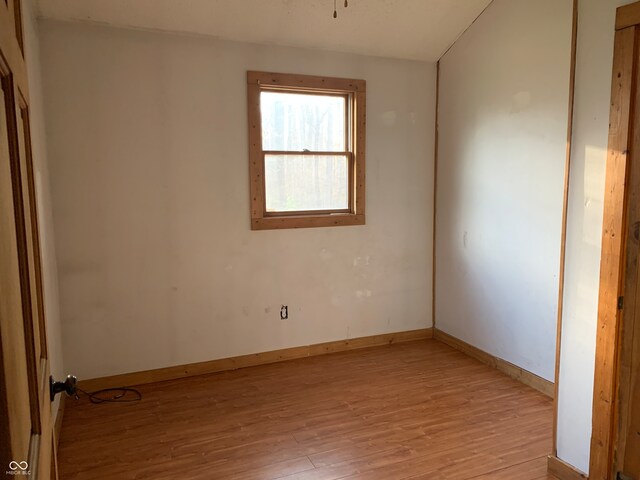 spare room featuring light hardwood / wood-style floors